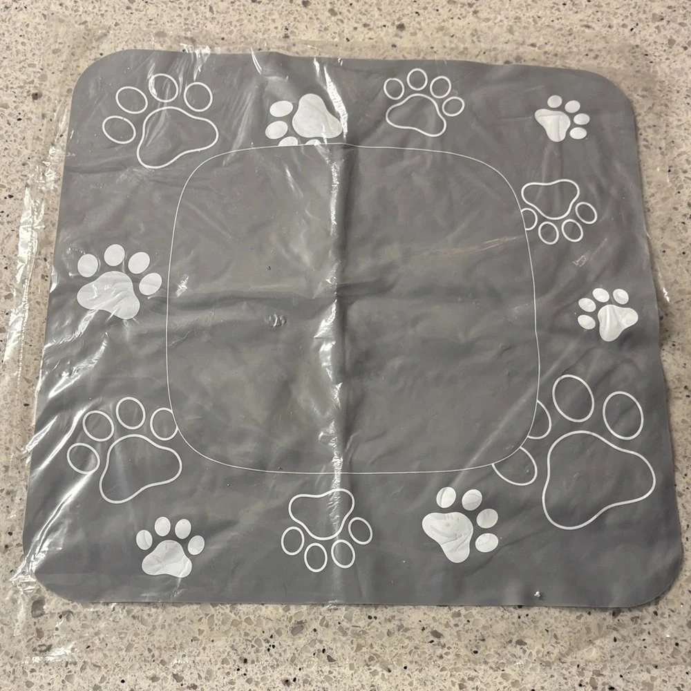 Gray Pet Feeding Mat with Paw Prints, Brand New